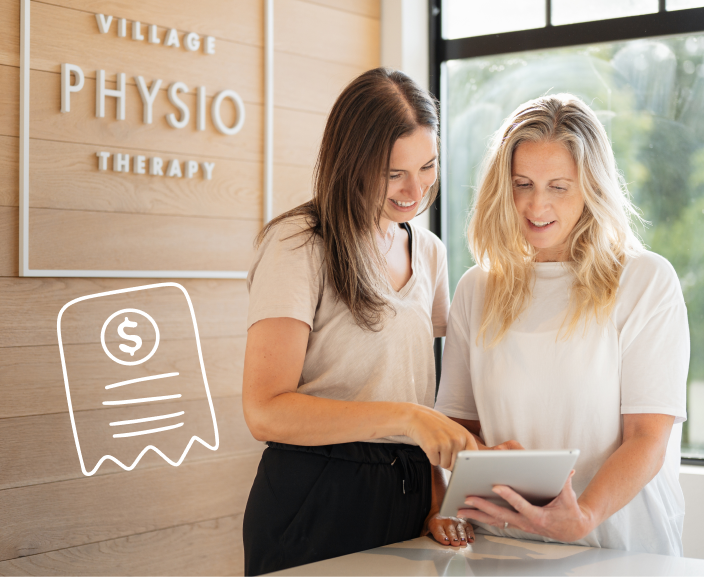 Two women at Village Physiotherapy clinic reviewing information on a tablet together, with billing icon overlay