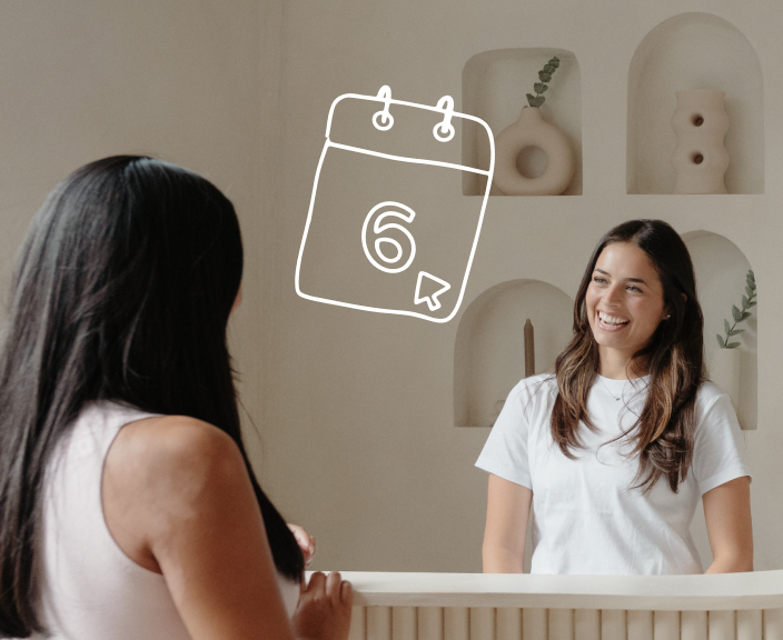 Two women having a conversation with a calendar icon showing the number 6 overlaid on the image