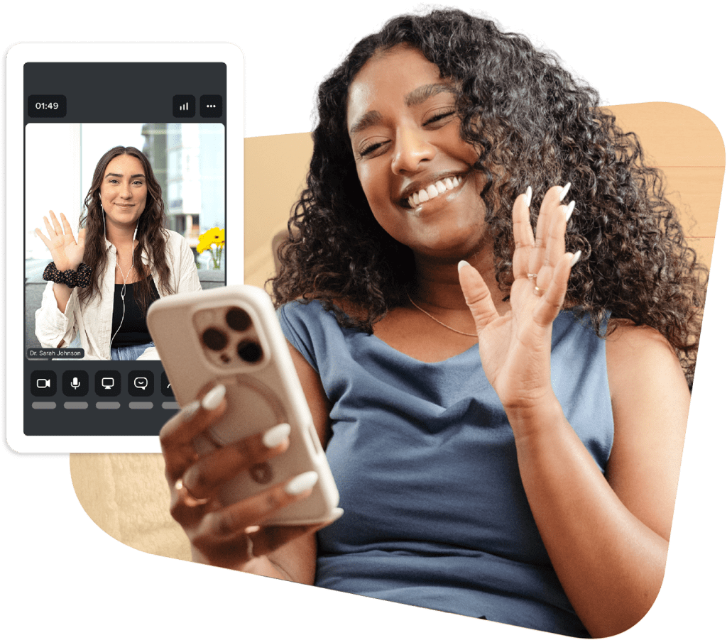 Woman with curly hair waving during a video call with Dr. Sarah Johnson, who is also waving on the phone screen